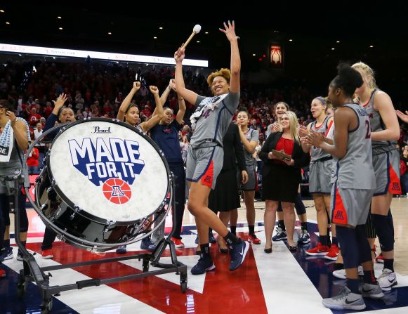 Arizona Wildcats center Semaj Smith celebrates at center court with her teammates after they defeated the Santa Barabara Gauchos in a women's college basketball game in Tuscon, Arizona, on December 21.