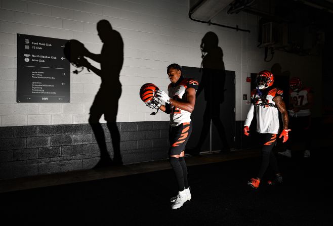 Cincinnati Bengals defensive back William Jackson walks through a tunnel towards the field before a football game against the Miami Dolphins in Miami, Florida, on December 22.
