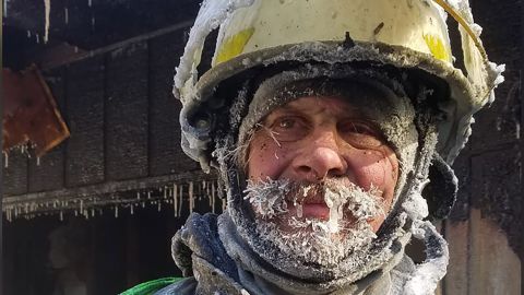 Assistant Chief Bimbo Gifford after battling a fire in freezing temperatures.