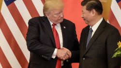 TOPSHOT - US President Donald Trump (L) shakes hand with China's President Xi Jinping at the end of a press conference at the Great Hall of the People in Beijing on November 9, 2017.
Donald Trump and Xi Jinping put their professed friendship to the test on November 9 as the least popular US president in decades and the newly empowered Chinese leader met for tough talks on trade and North Korea. / AFP PHOTO / Fred DUFOUR        (Photo credit should read FRED DUFOUR/AFP via Getty Images)