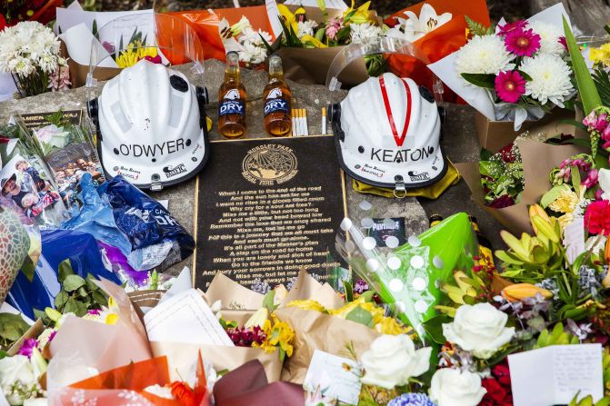 Tributes for volunteer firemen Andrew O'Dwyer and Geoffrey Keaton are seen at Horsley Park Rural Fire Brigade in Sydney, Australia, on December 22. It's believed they were killed when their vehicle hit a tree before rolling off the road, the <a href="index.php?page=&url=https%3A%2F%2Fedition.cnn.com%2F2019%2F12%2F20%2Faustralia%2Faustralia-firefighter-death-intl-hnk-scli%2Findex.html" target="_blank">New South Wales Rural Fire Service said in a statement</a>.