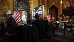 President Donald Trump speaks during a Christmas Eve video teleconference with members of the military at his Mar-a-Lago estate in Palm Beach, Fla., Tuesday, Dec. 24, 2019. (AP Photo/Andrew Harnik)