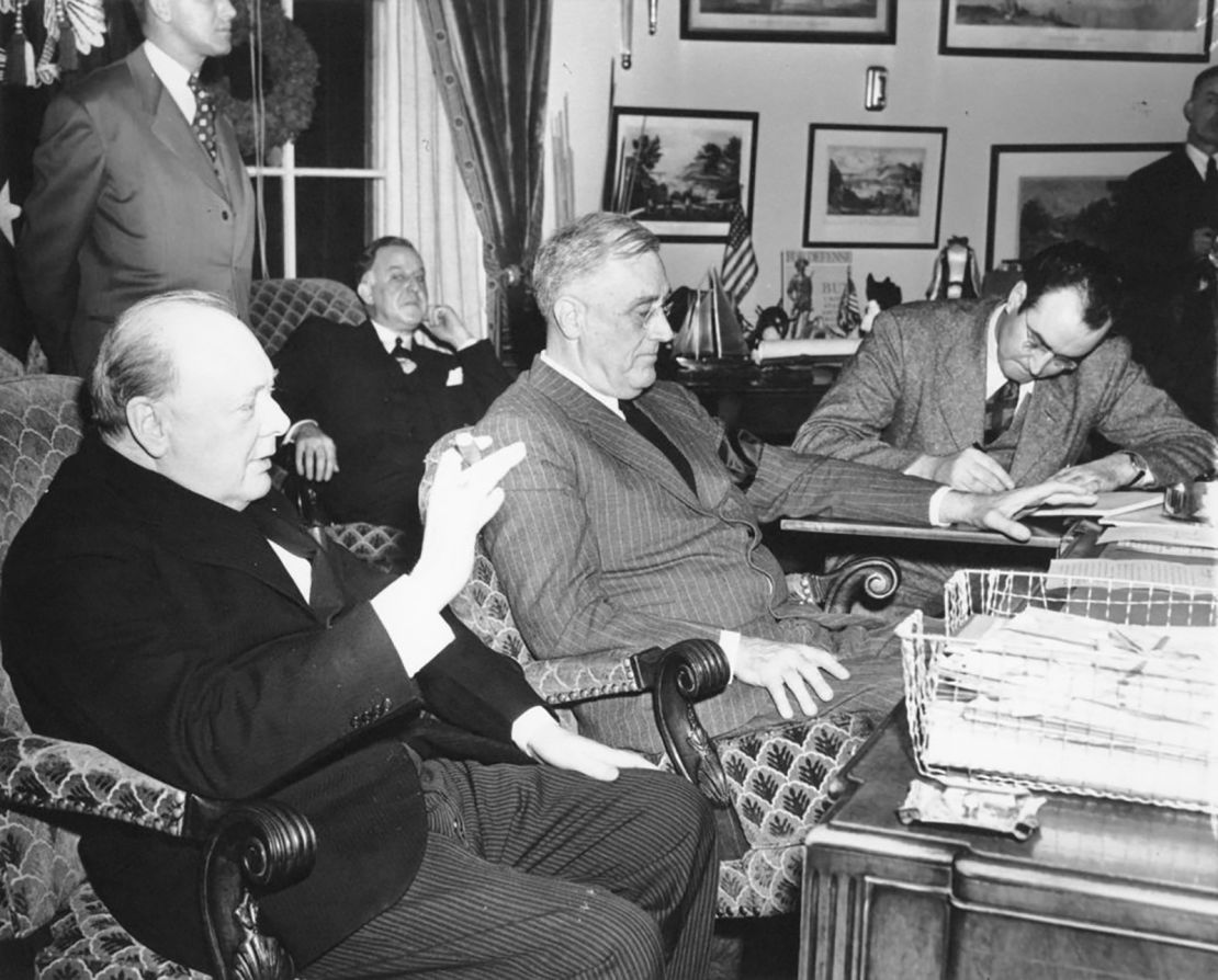 President Franklin Roosevelt and British Prime Minister Winston Churchill give a joint press conference on December 23, 1941 in the Oval Office.