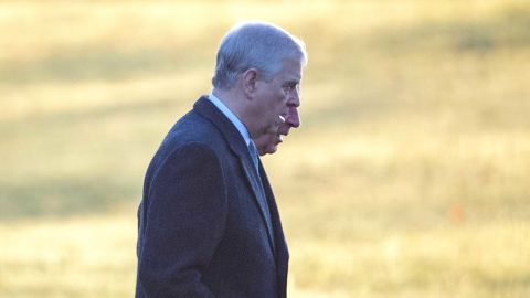 Prince Andrew and his brother, Prince charles are seen walking side by side into St. Mary Magdalene Church in Sandringham, Norfolk on Wednesday.