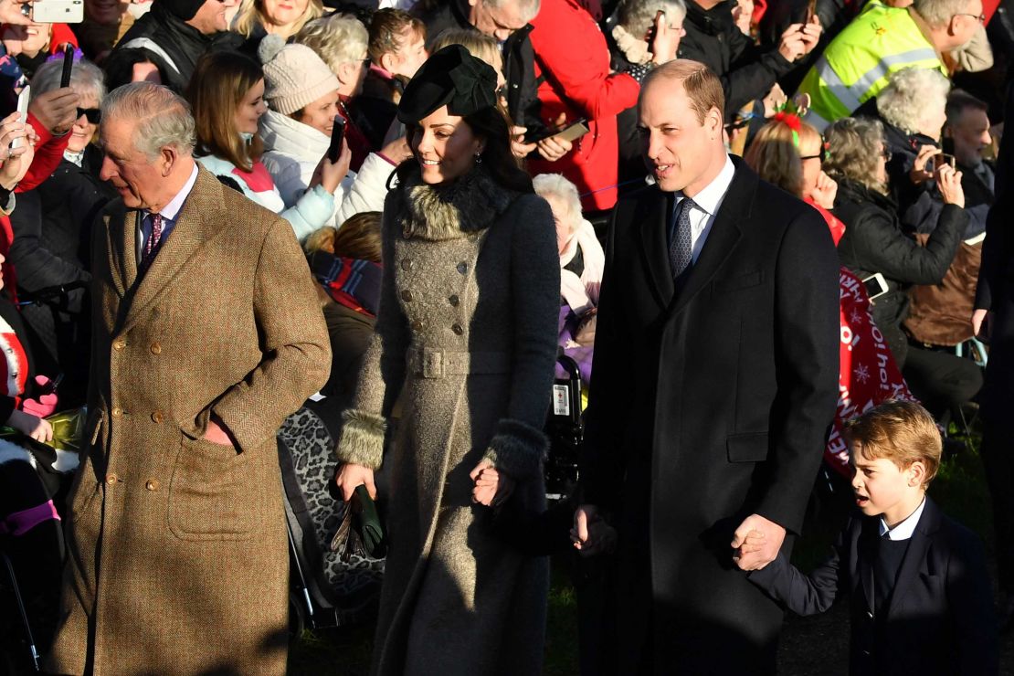 Prince Charles,  Catherine, Duchess of Cambridge, Princess Charlotte of Cambridge (unseen), Prince William and Prince George arrive for the royal family's traditional Christmas Day service at St. Mary Magdalene Church in Sandringham, Norfolk, eastern England, on December 25, 2019.