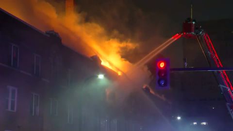 Firefighters had to evacuate the building to fight the blaze from the outside.