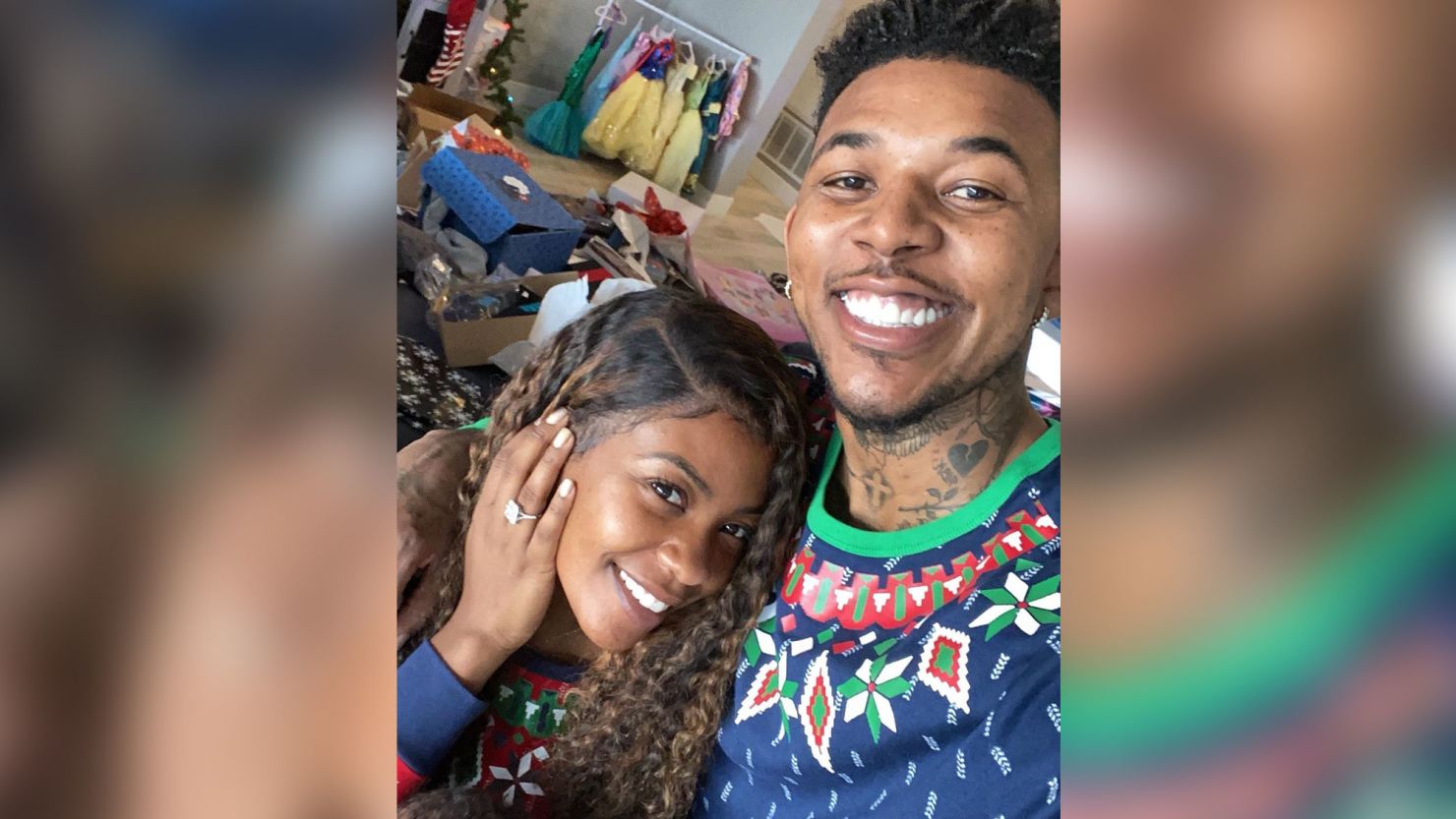 Nick Young and Keonna Green smile after getting engaged on Christmas. 