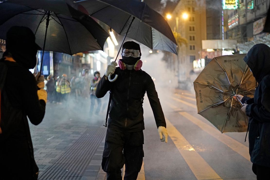 Tear gas is seen on the streets of Hong Kong on Christmas Eve.