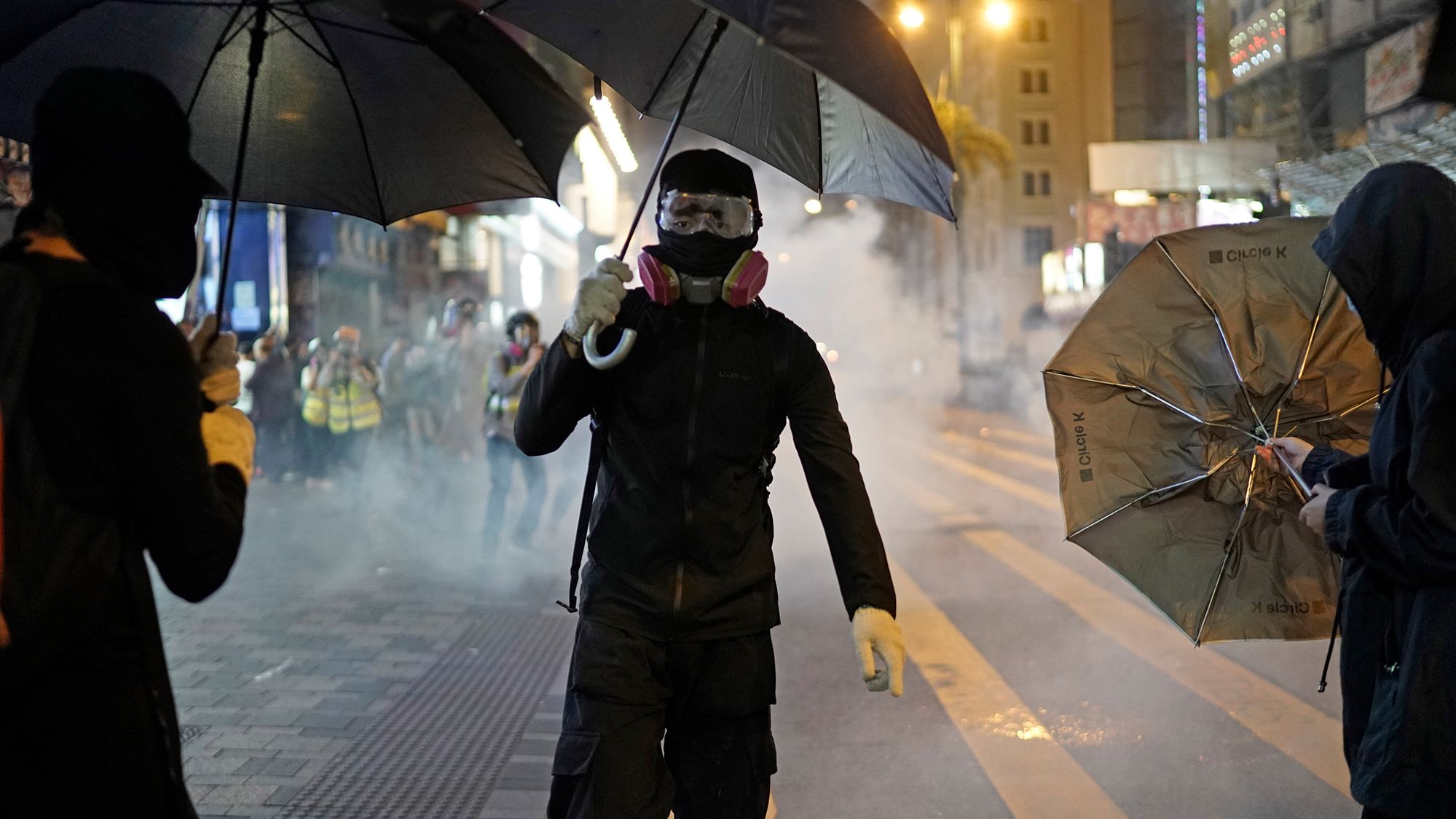 Tear gas is seen on the streets of Hong Kong on Christmas Eve.