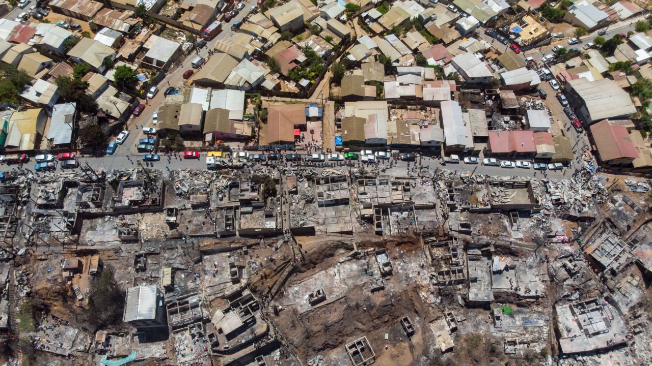 Aerial view of burnt houses after a forest fire in Valparaiso, Chile.