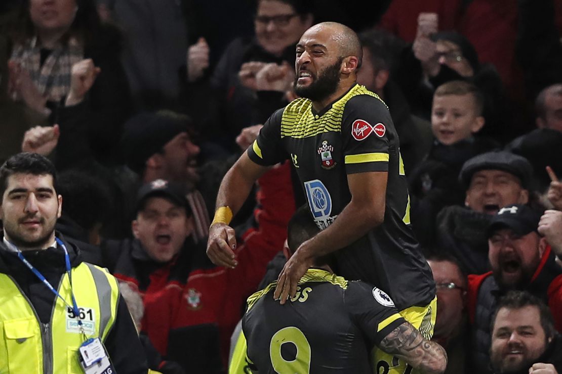 Southampton's Nathan Redmond is lifted by substitute Danny Ings after scoring his side's second goal in the 2-0 Boxing Day victory at Chelsea. 