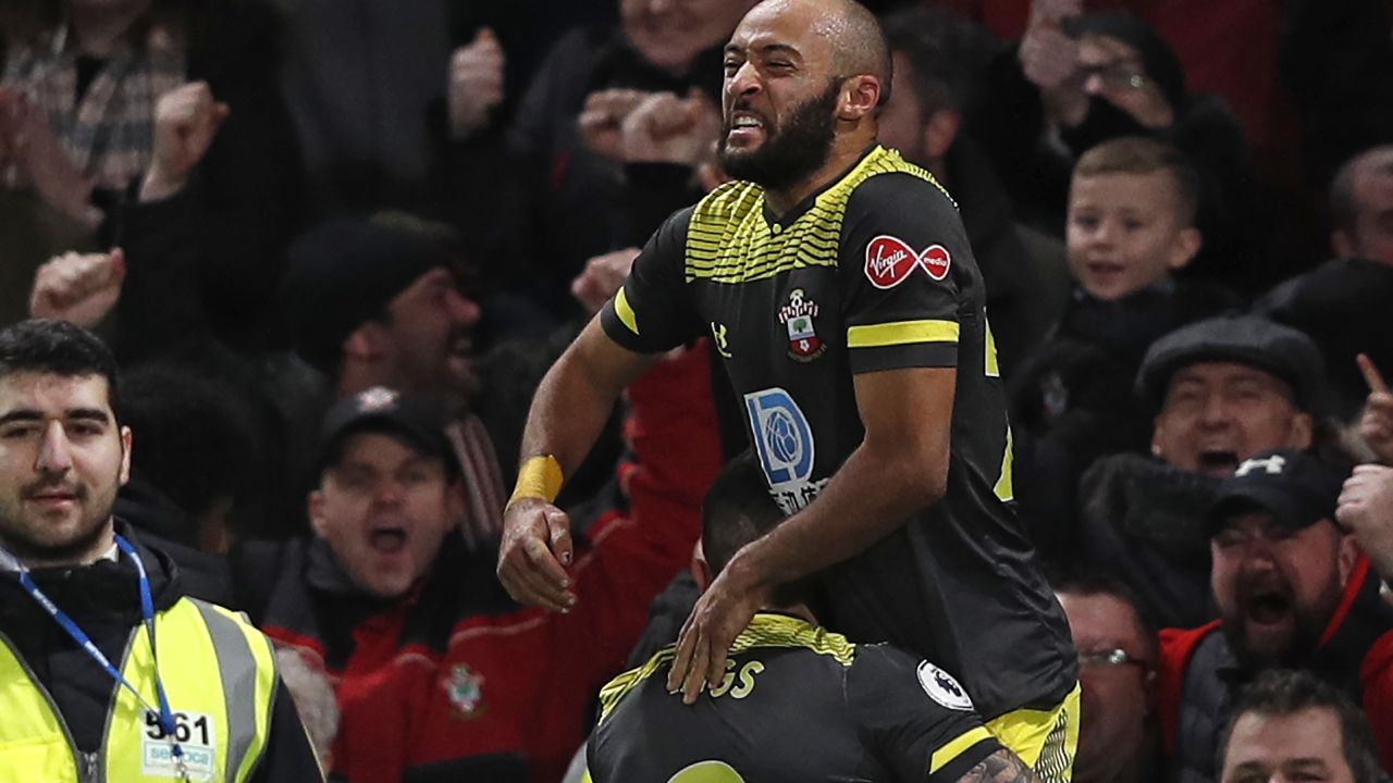 Southampton's Nathan Redmond is lifted by substitute Danny Ings after scoring his side's second goal in the 2-0 Boxing Day victory at Chelsea. 