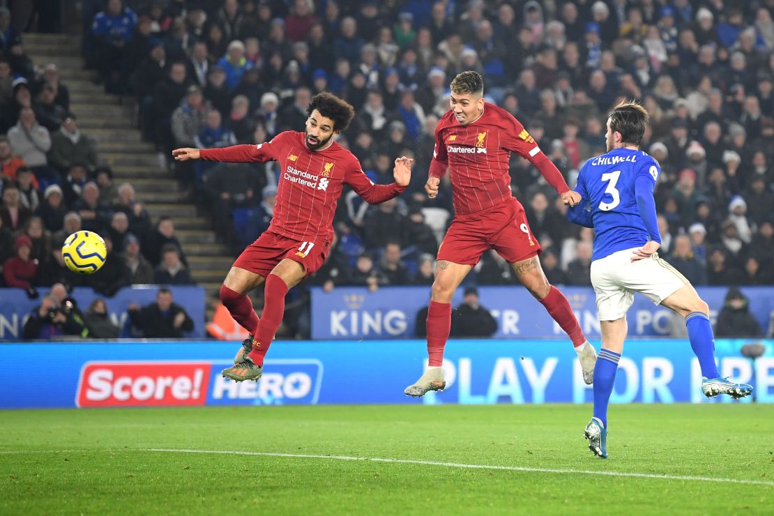 Roberto Firmino heads Liverpool in front in close company with fellow striker Mo Salah in the top of the table clash with Leiceser City at the the King Power Stadium. 