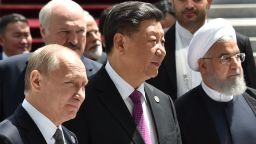 Russian President Vladimir Putin, Chinese President Xi Jinping and Iran's President Hassan Rouhani walk as they attend a meeting of the Shanghai Cooperation Organisation (SCO) Council of Heads of State in Bishkek on June 14, 2019. (Photo by Vyacheslav OSELEDKO / AFP)        (Photo credit should read VYACHESLAV OSELEDKO/AFP via Getty Images)