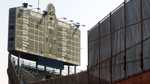 The scoreboard is shown at Wrigley Field.