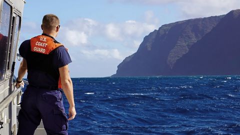 In this photo released by the U.S. Coast Guard, Coast Guard Cutter William Hart moves toward the Na Pali Coast on the Hawaiian island of Kauai on Friday.