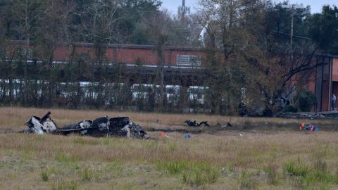 The charred wreckage of a plane crash in Lafayette, Louisiana, Saturday, December 28, 2019.