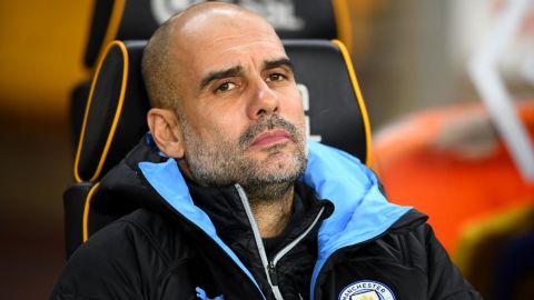 Manchester City manager Pep Guardiola saw his team blow a two-goal lead Friday. 