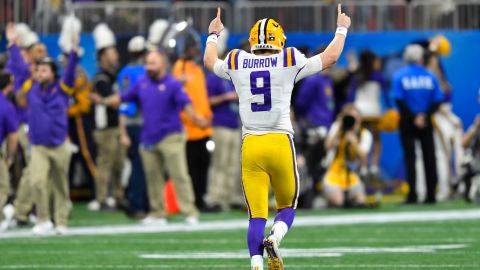 LSU quarterback Joe Burrow celebrates a touchdown against Oklahoma during the first half of the Chick-fil-A Peach Bowl.