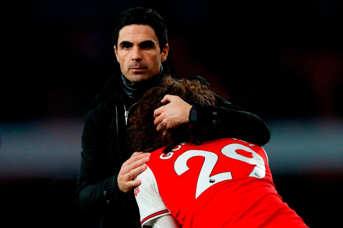 Arsenal manager Mikel Arteta hugs Matteo Guendouzi after Arsenal lost 2-1 to Chelsea. 