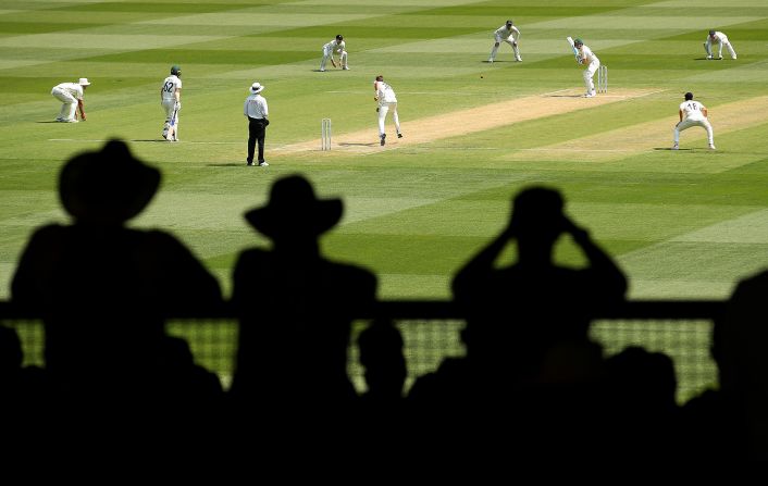 Cricket fans watch from the stands as Steve Smith bats during day two of the Second Test match between Australia and New Zealand on Friday, December 27, in Melbourne, Australia.