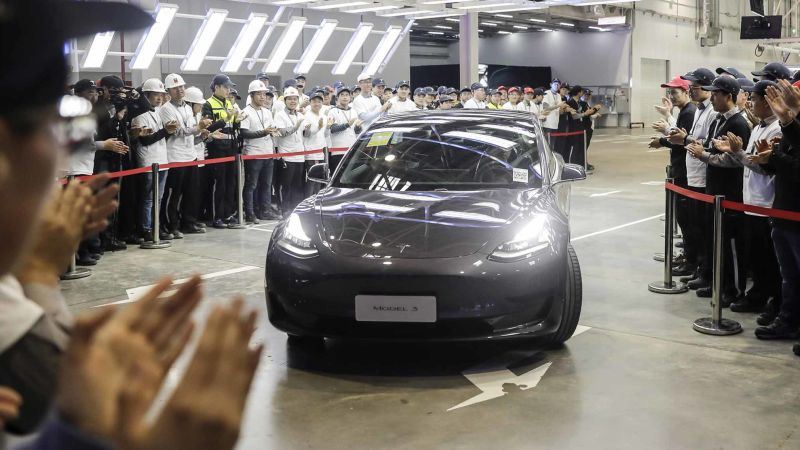 Tesla delivers first China-made Model 3s to its own workers | CNN Business