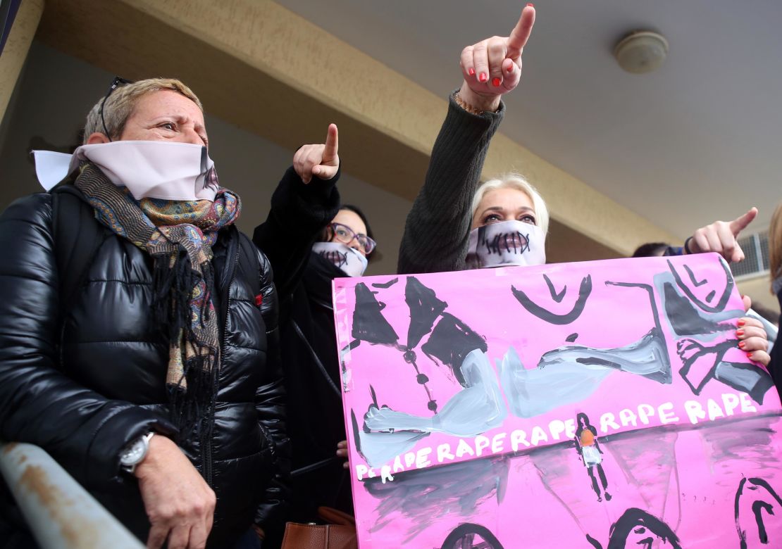 Rights activists stage a demonstration outside the court in Cyprus on Monday. 