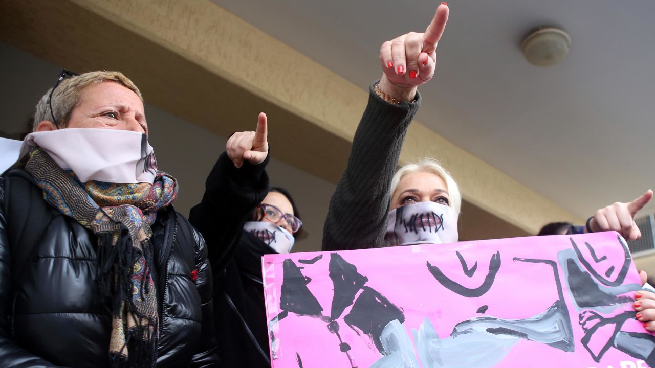 Rights activists stage a demonstration outside the court in Cyprus on Monday. 