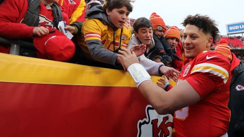  Kansas City Chiefs quarterback Patrick Mahomes celebrates with fans after the Chiefs defeated the Los Angeles Chargers 31-21 on December 29, 2019.