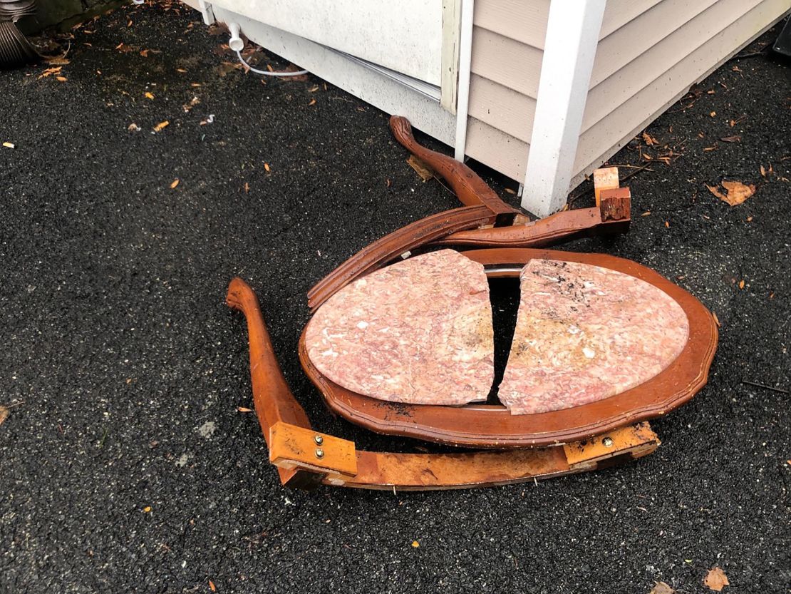 Josef Gluck said he used this table to hit the knife-wielding man in the face.