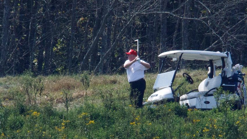 President Donald Trump participates in a round of golf at the Trump National Golf Course in Sterling, Virginia, in September 2019.