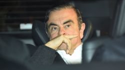 TOPSHOT - Former Nissan chairman Carlos Ghosn leaves his lawyers' offices after he was released earlier in the day from a detention centre after posting bail in Tokyo on March 6, 2019. - Ghosn posted bail of 1 billion yen (9 million USD) in cash on March 6, paving the way for his release from the Tokyo detention centre after more than three months in custody. (Photo by Kazuhiro NOGI / AFP)        (Photo credit should read KAZUHIRO NOGI/AFP via Getty Images)