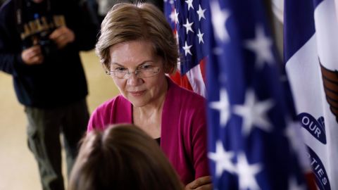 Democratic presidential candidate Sen. Elizabeth Warren, D-Mass., speaks with an audience member during a town hall meeting, Monday, Dec. 16, 2019, in Keokuk, Iowa. 