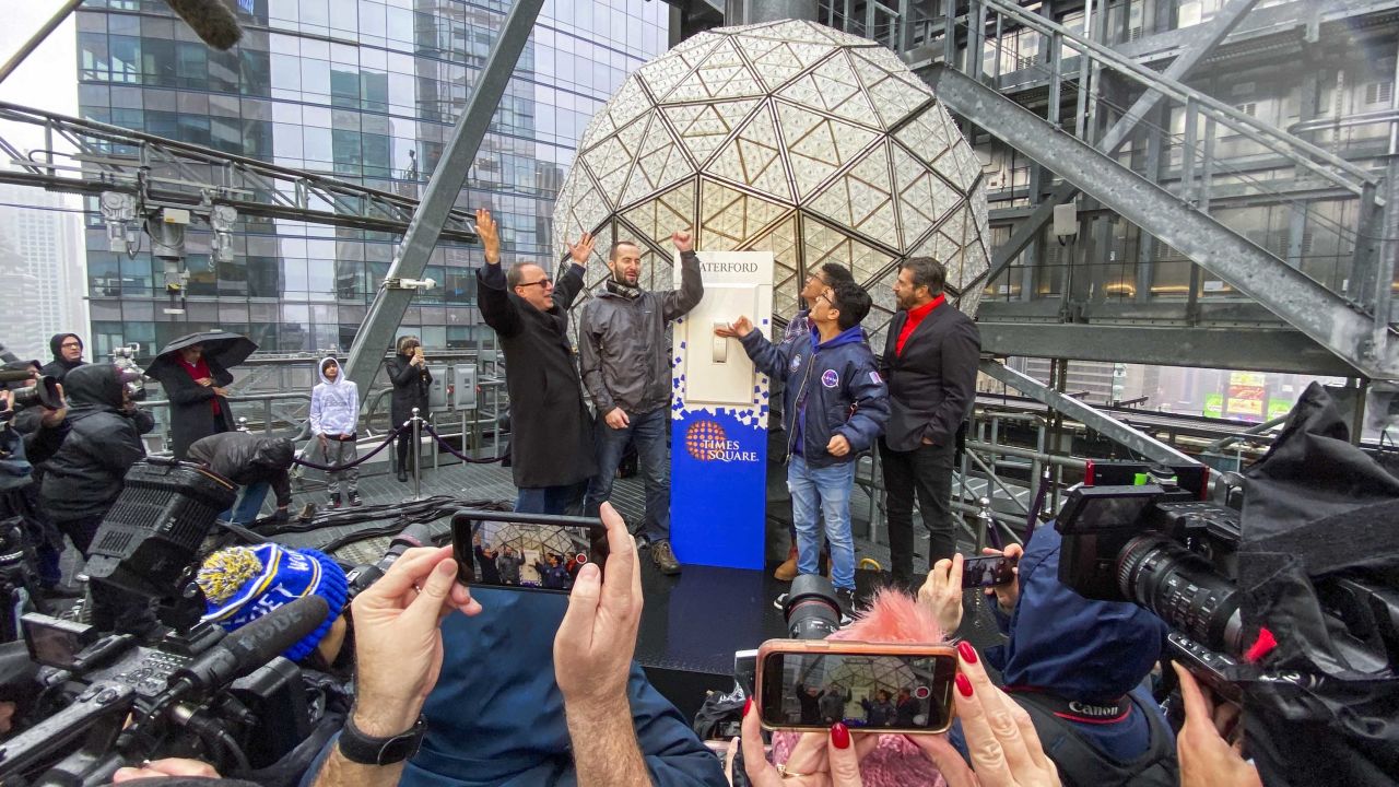 Tim Tompkins, (R) President Times Square Alliance, Jeffrey Straus, (L) President of Countdown Entertainment and Co-Producer of New Year's Eve, and guests Jared Fox, Ricardo Herrera, and Van Troy Ulloa attend the New Year's Eve Ball final test before Times Square Celebrations at One Times Square on December 30, 2019 in New York City. 