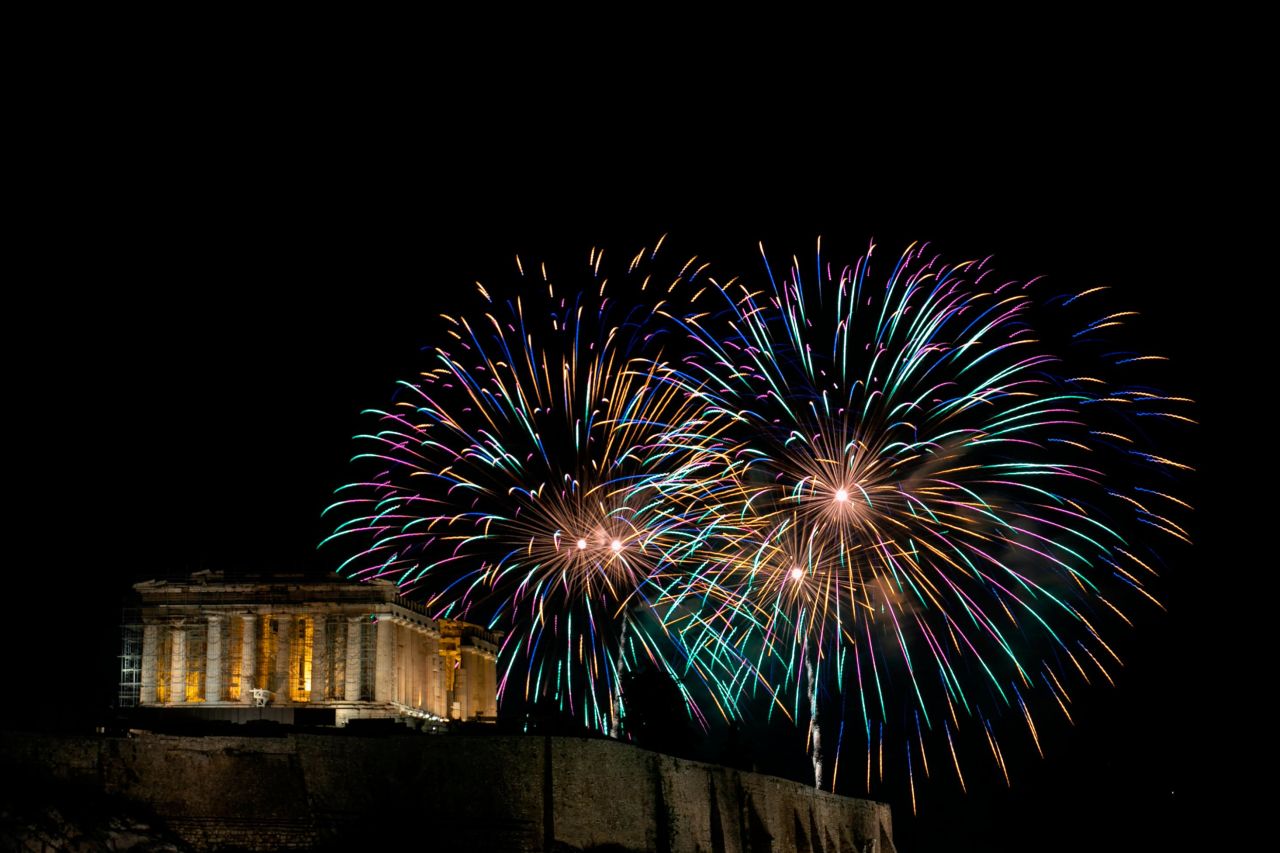 Fireworks explode over the ancient Parthenon temple on the Acropolis hill as the new year begins in Athens, Greece.