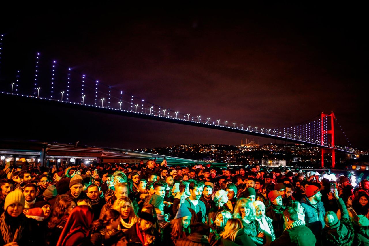 People wait for the new year in Ortakoy Square in Istanbul.