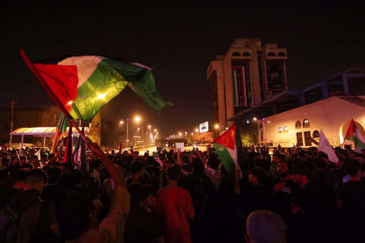 Iraqis take part in a protest  in Baghdad, Iraq, on October 18, 2023.