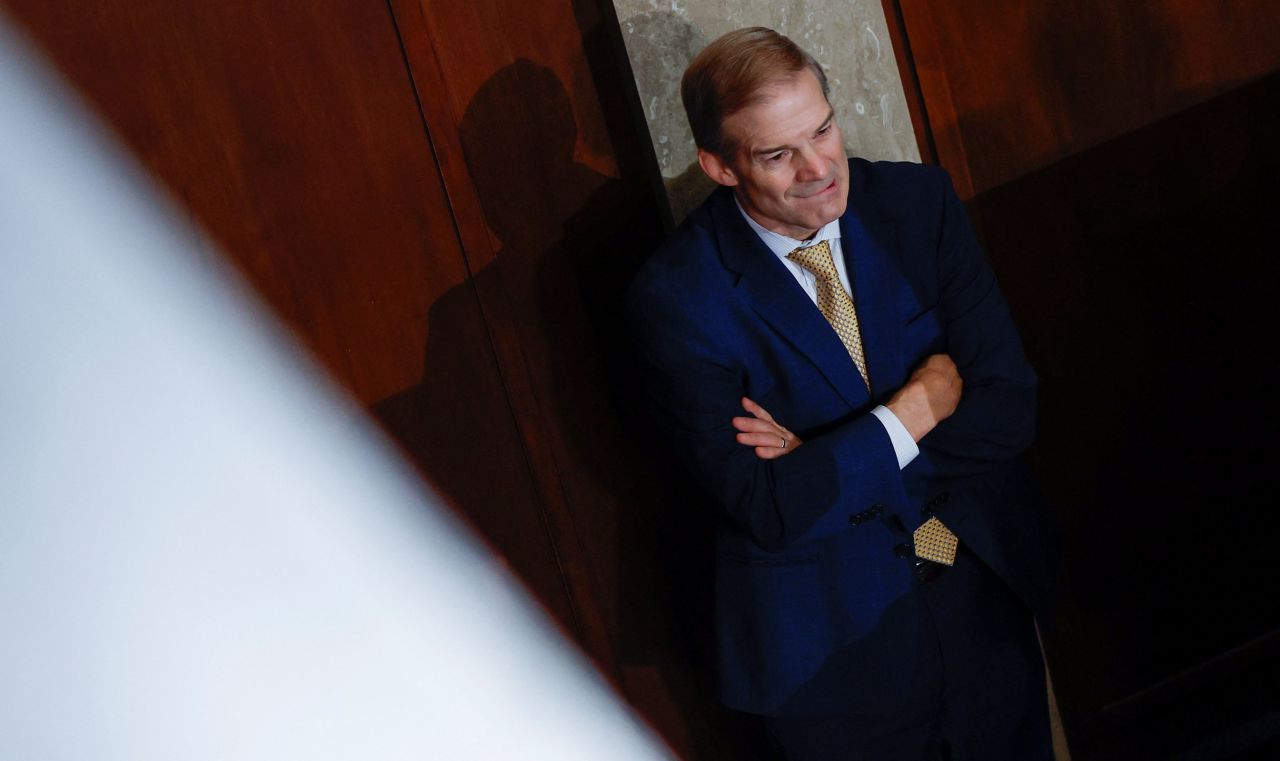 Rep. Jim Jordan stands alone at the back wall of the House Chamber shortly before the start of the first round of voting for a new Speaker at the Capitol in Washington, DC, on October 17.