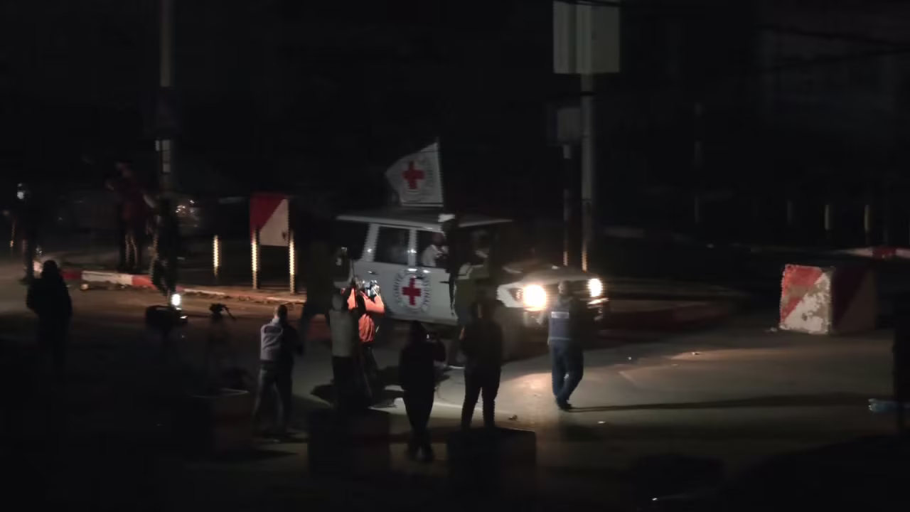 A Red Cross convoy enters the Rafah border crossing late Saturday night.