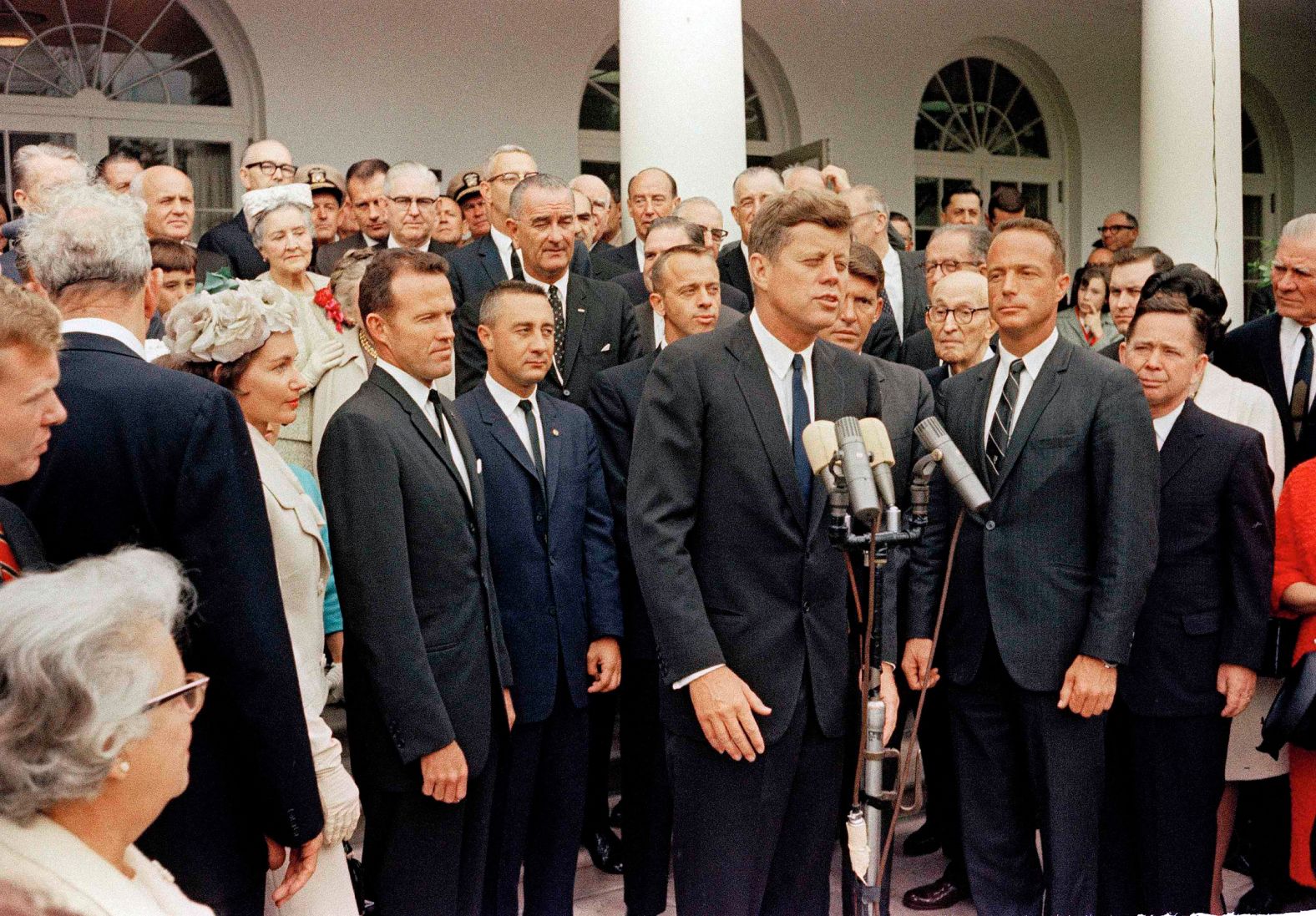 U. S. President John F. Kennedy, honoring the Mercury Astronauts at the White House during a reception, May 21, 1963. Others unidentified. (AP Photo)