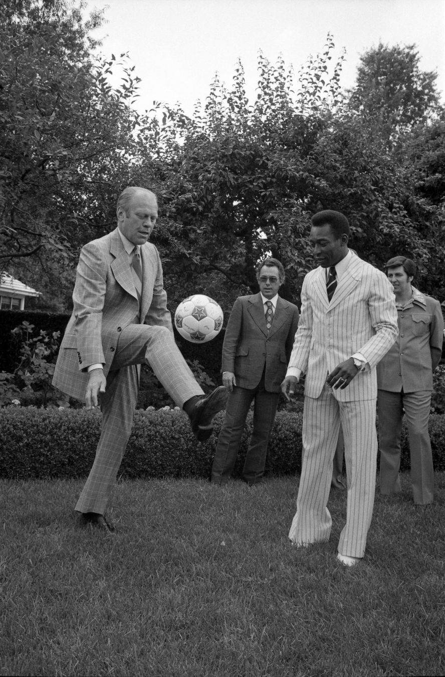 President Gerald Ford juggles a soccer ball with Pelé, the Brazilian soccer star who became a global icon, in the Rose Garden in June 1975.