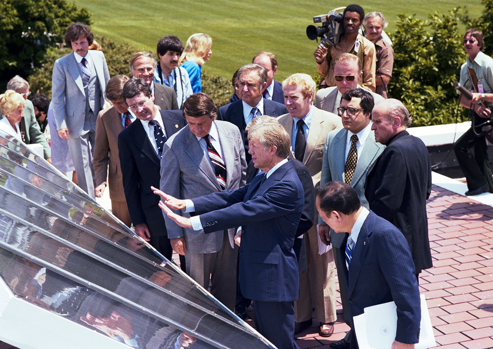 President Jimmy Carter shows reporters a newly installed solar panel at the Rose Garden in June 1979. The panels were removed during the Reagan administration.