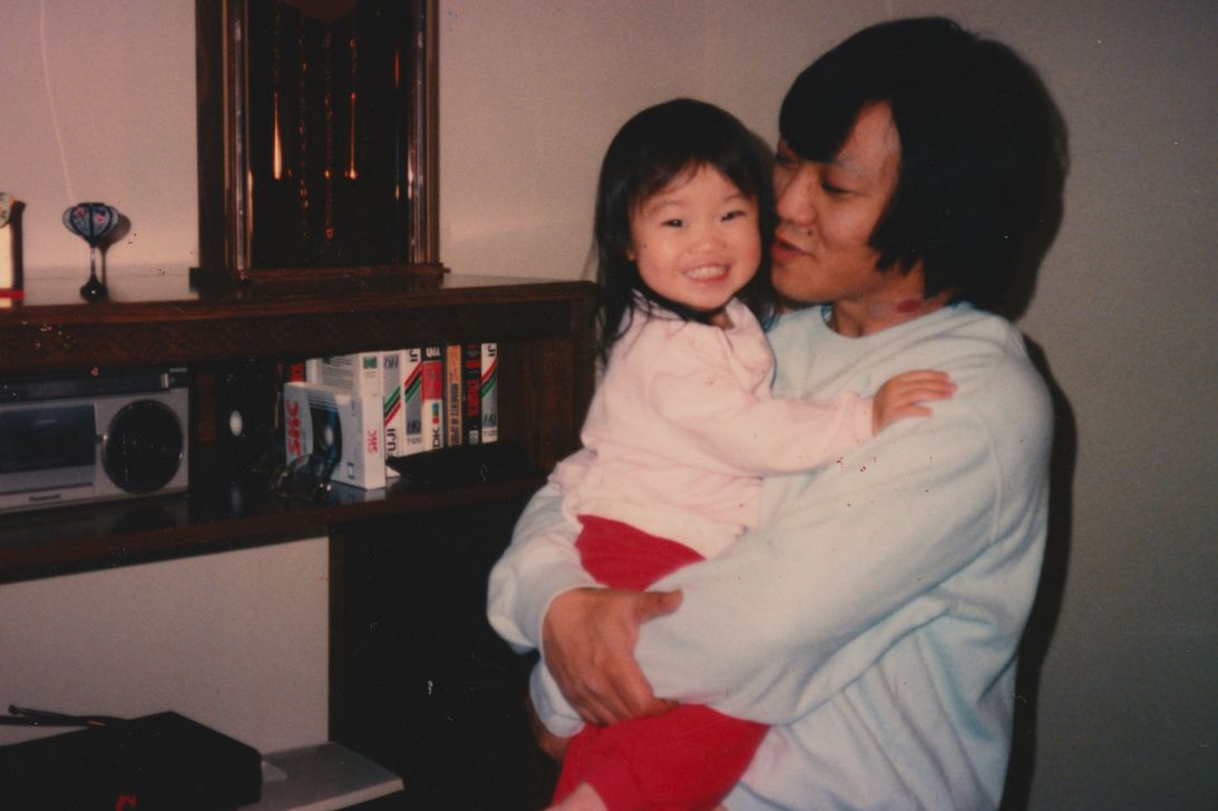Mayumi and her father in 1990.