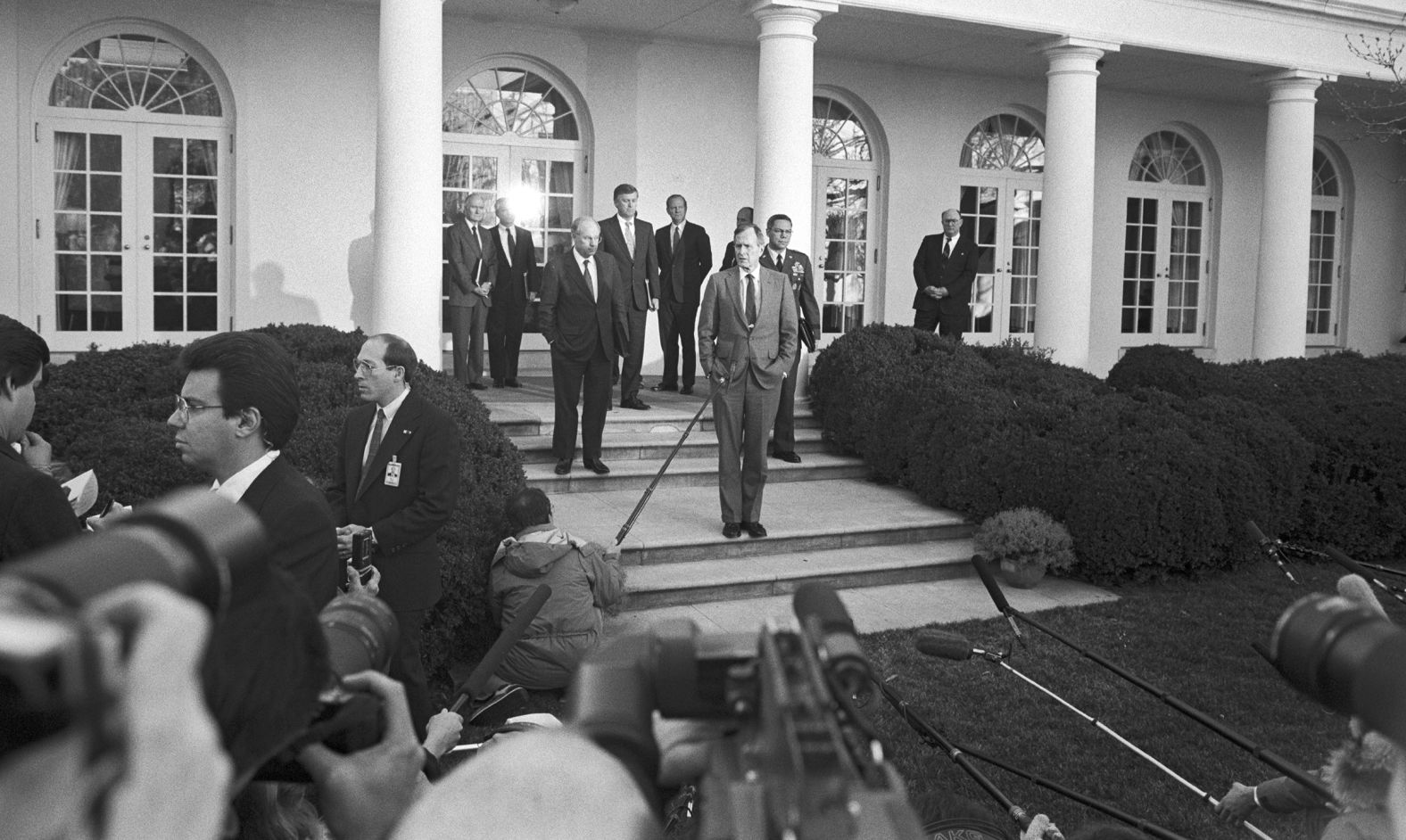 WASHINGTON DC - FEBRUARY 11: U.S President George H.W. Bush in the Rose Garden at the White House talk about the visit of Sec. of Defense Dick Cheney and Gen. Colin Powell who had just returned from the Middle East prior to commencement of Desert Storm, the 1991 ground war with Iraq, February 11, 1991 in Washington, DC.