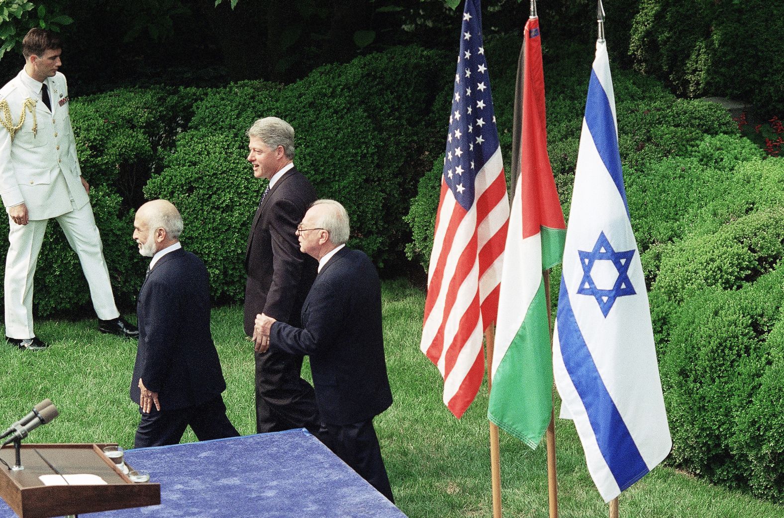 President Bill Clinton, along with King Hussein of Jordan, left, and Israeli Prime Minister Yitzhak Rabin, leave the Rose Garden in July 1994. Shortly after, the leaders signed a declaration establishing peace between the two countries.