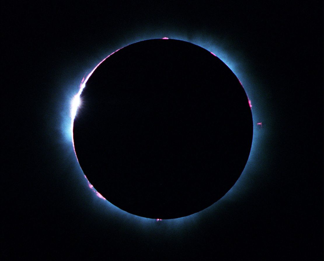 Baily's beads can be seen shining around the left side of the moon just a second before it completely covers the sun.