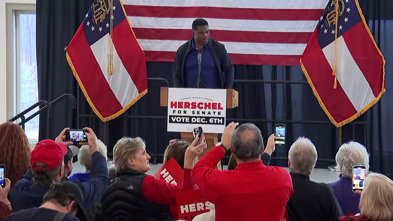 Herschel Walker speaks at a campaign stop in Ellijay, Georgia, on Monday.