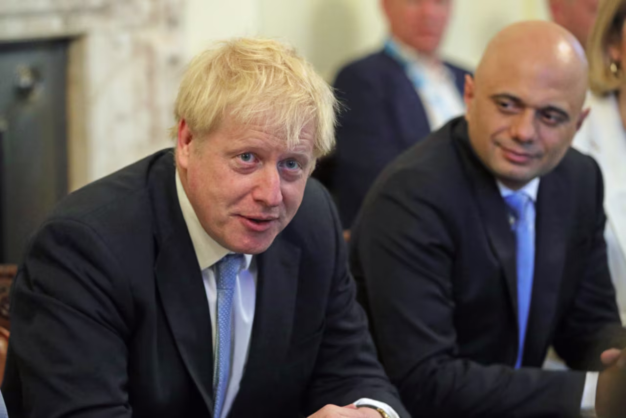 Johnson, left, and his Chancellor Sajid Javid, right.