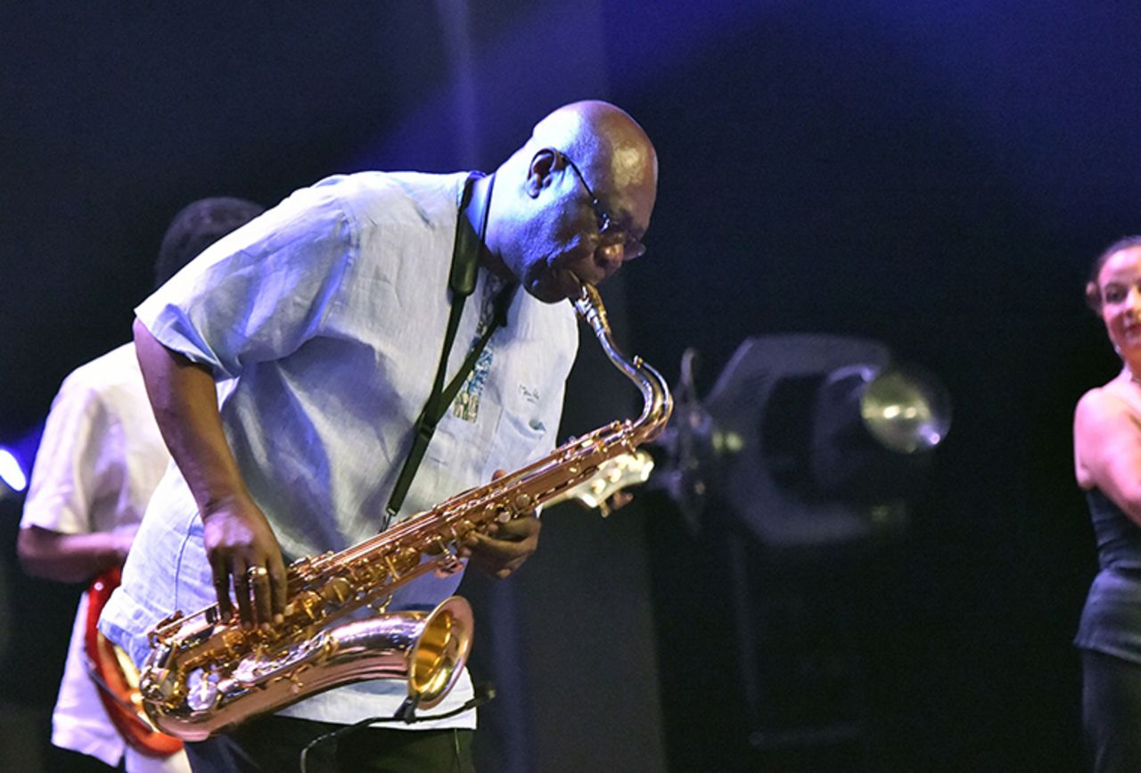 Manu Dibango performs on June 29, 2018 at the Ivory Hotel Abidjan