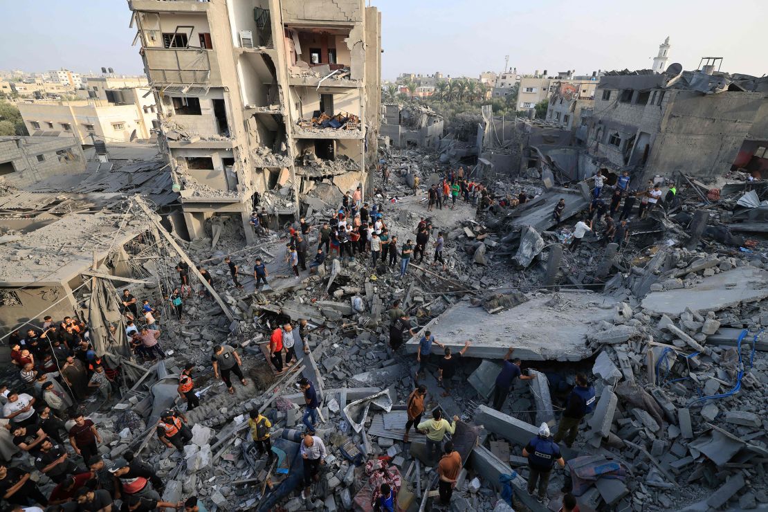 People check the damage caused by an Israeli strike on the Al-Maghazi refugee camp in Deir Balah in the central Gaza Strip, on November 5.